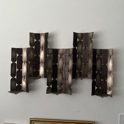 Wall mounted candle holder $5