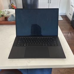 DELL XPS 9510 OLED GREAT FOR HEAVY LOADS