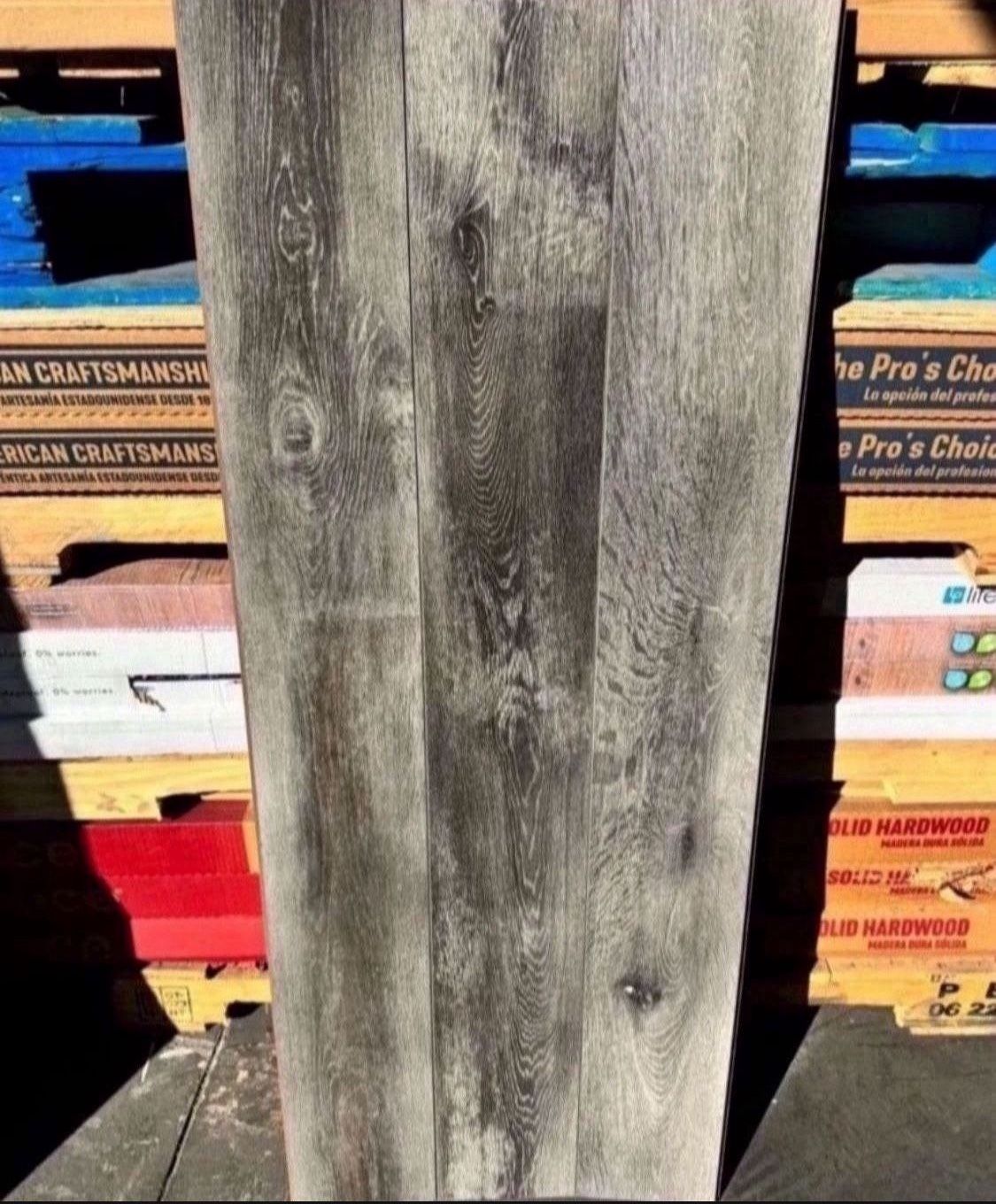 Dowden Gray Oak 12 mm T x 6.3 in. W Water Resistant Laminate Wood Flooring (16.8 sqft/case)