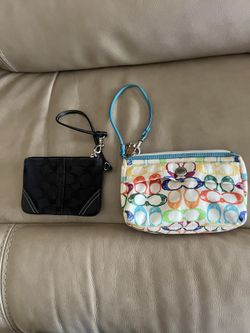 REDUCED! Lovely Scribbles Coach Wristlet.