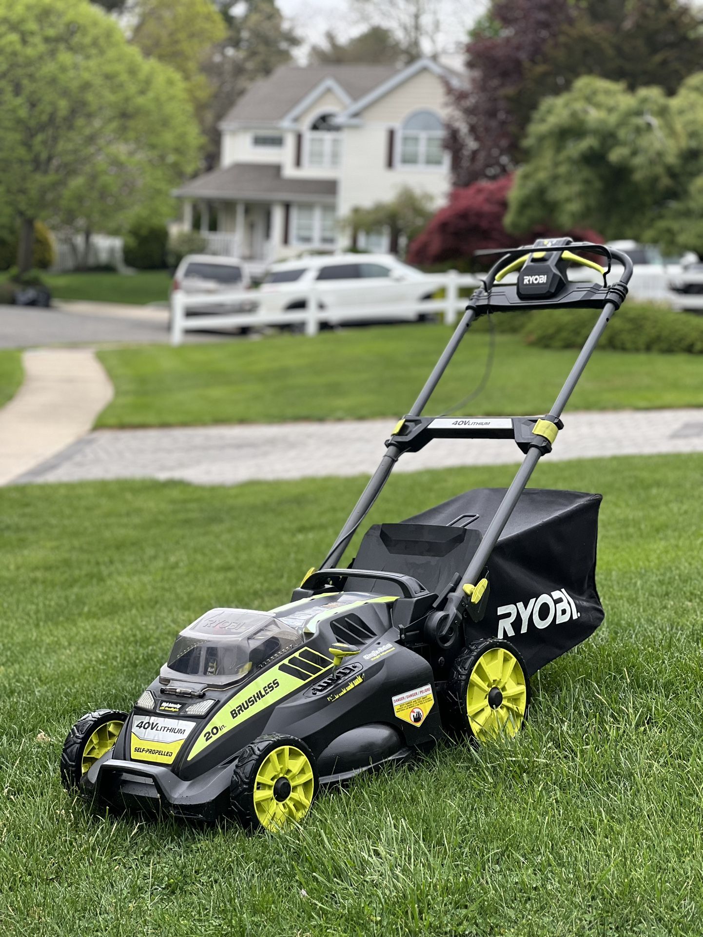 Ryobi. 20" 40-Volt Cordless Battery Self Propelled Lawn Mower with 5.0 battery and charger