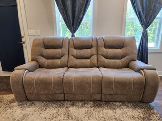 Laredo Springs dual power reclining (2) sofas and 1 dual power reclining recliner