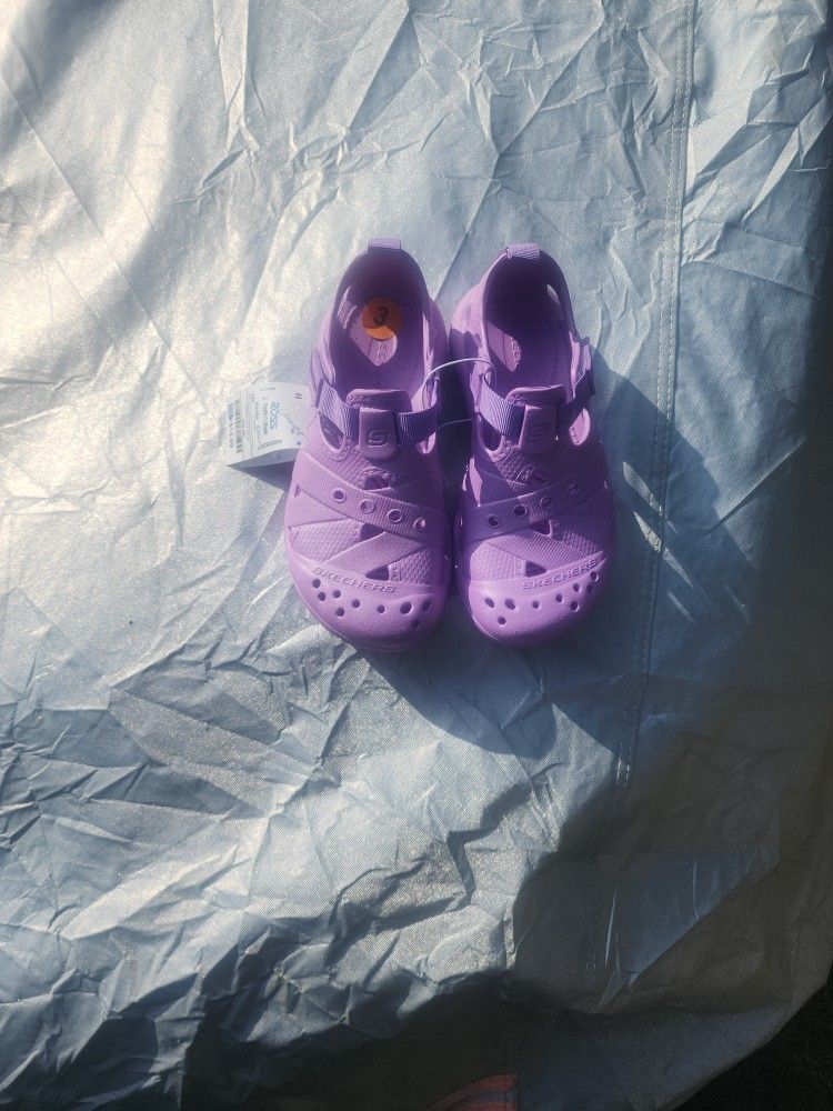 Sketchers Sandals.
Size 3