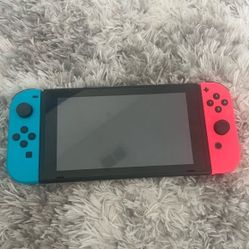 Nintendo Switch with Neon Blue and Neon