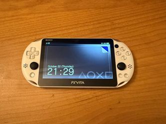 PSVita PCH-2000 Japan edition + 16GB original memory card and charger