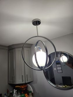 Dining lamp polished chrome- like new.