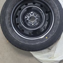 New 205/65R16 Tire Mounted on Steel Rim – Never Used”