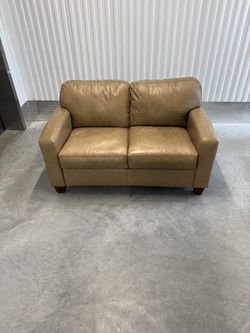 Small used couch with pullout bed.