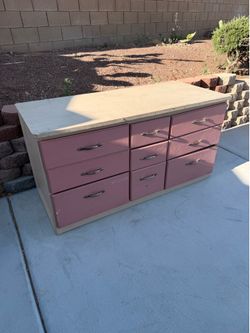 9-Drawer Pink and Tan Wooden Dresser