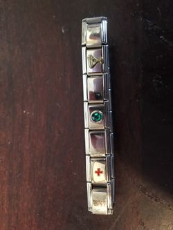 Charm bracelet w Red Cross nurse , green stone November birth stone, Martini cocktail charm 3 charms filled in