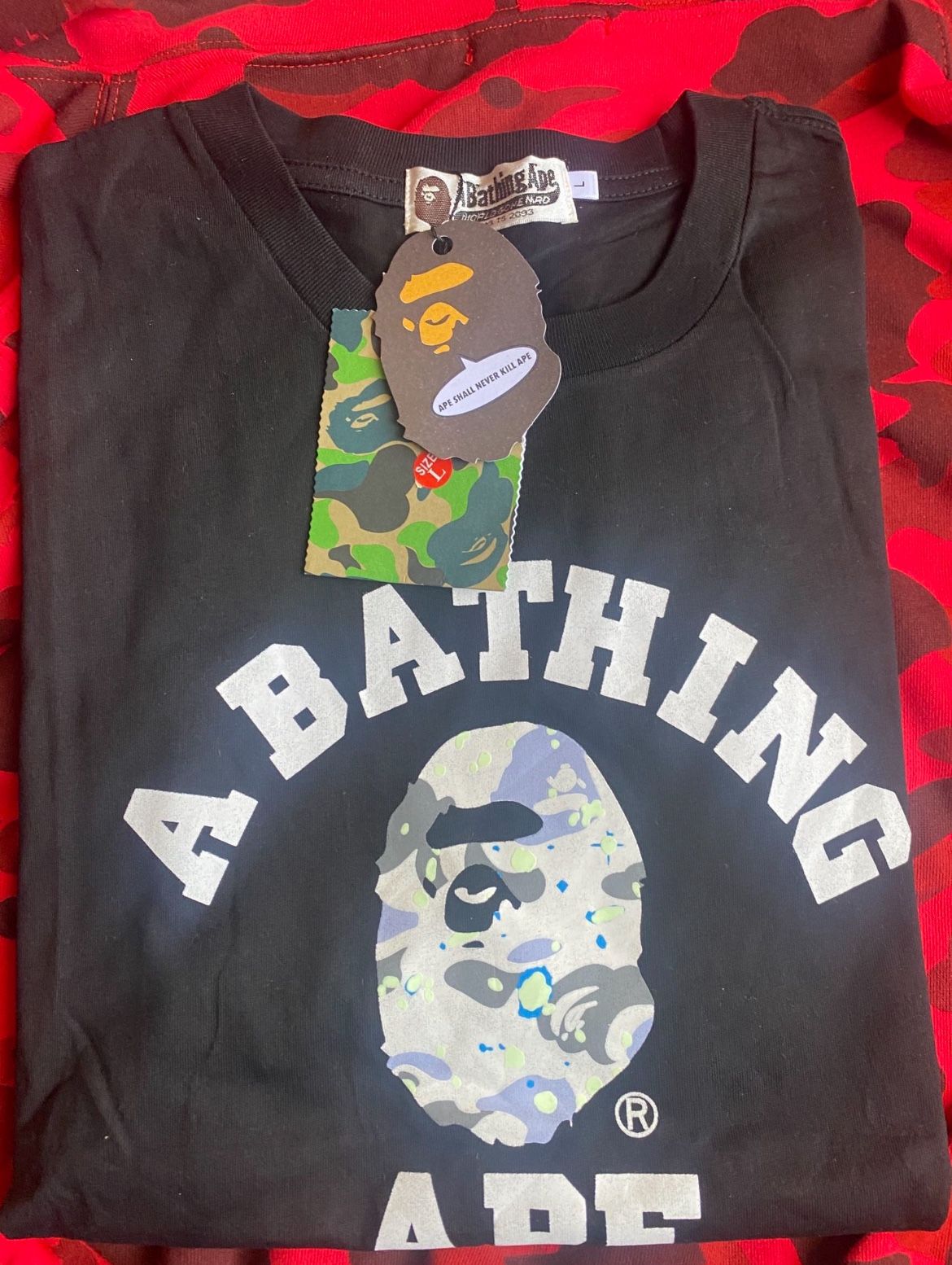 black glow in the dark bape shirt
