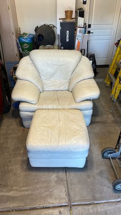 Natuzzi leather chair and ottoman