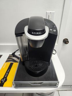 1- Cup Keurig K Maker & Pod Holder $19.99- Firm