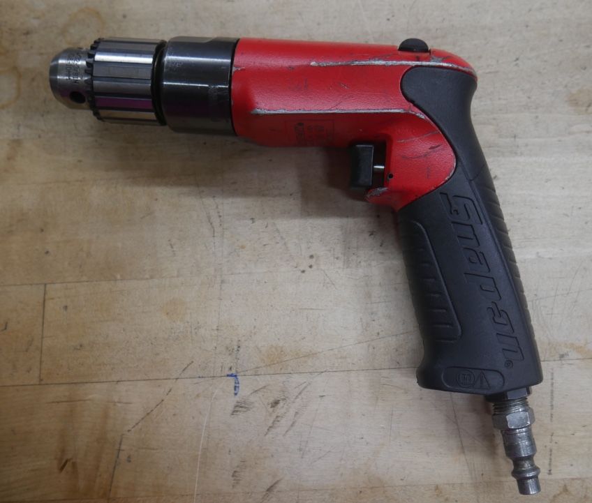 Snap On 3/8” Pneumatic Reversible Drill Red PDR3000A No Check Key pre owned. tested. in a good working order.