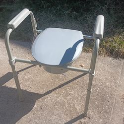 Over the toilet seat with handles