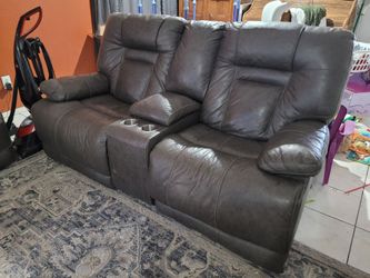 Powered reclining couch