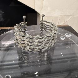 Wide Linked Ribbon Twist Silver Tone Bracelet