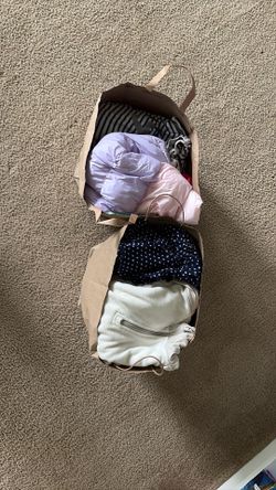 2 bags of girls used clothes 5$