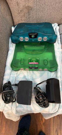 Nintendo 64 green one /blue one 16 games 7 controllers