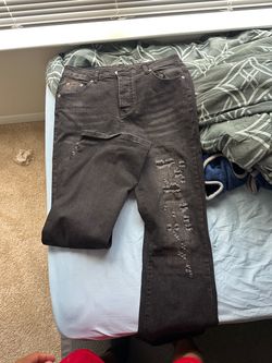 Stacked purple jeans