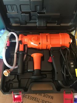 Hand held concrete drill $350 can be drill up to 4 1/2 inch holes perfect for the small job