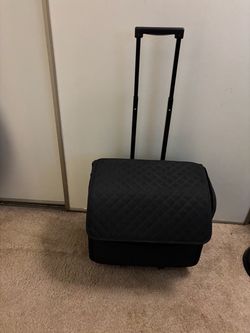BLACK luggage with wheels and handle