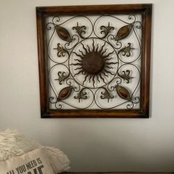 Metal iron wall piece.