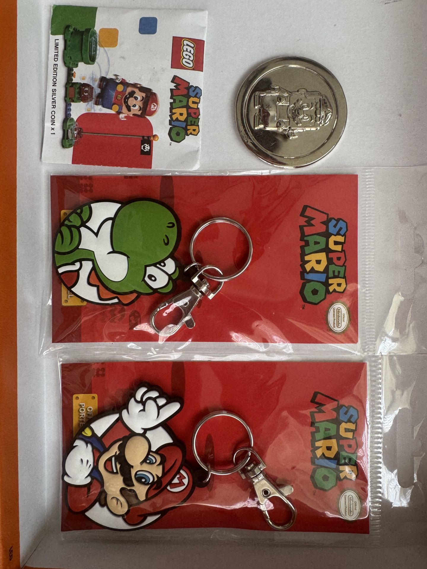 Super Mario Keychain And Rare Silver Coins