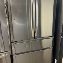 NEW OPEN BOX LG FOUR DOOR REFRIGERATOR 