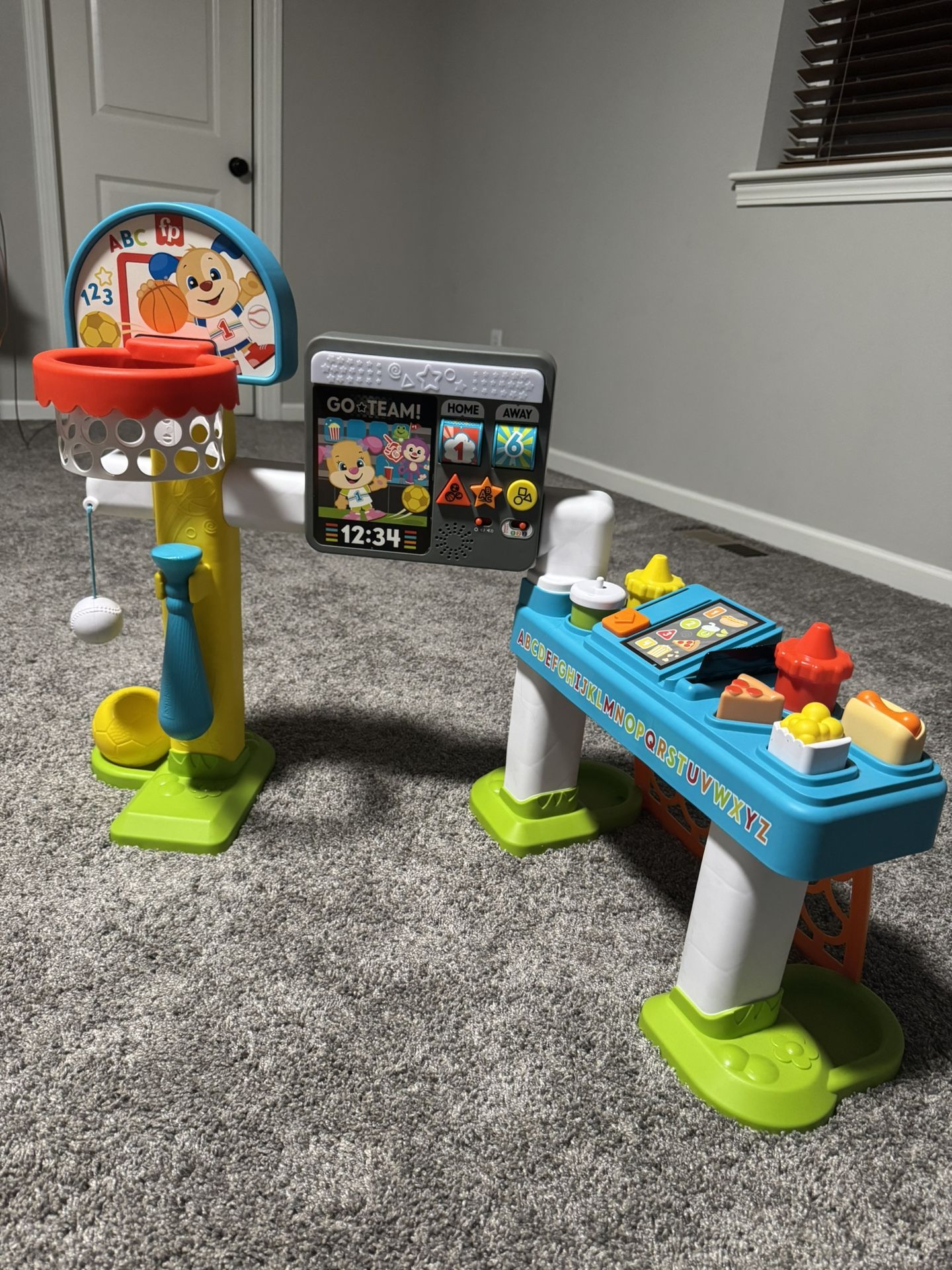 Fisher-Price Toddler Learning Toy Laugh & Learn 4-in-1 Game Experience Sports Activity Center with Smart Stages for Infants Ages 9+ Months​