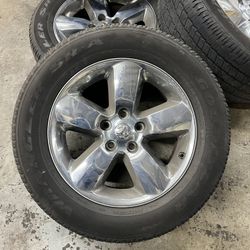 Set of  4 OEM Dodge Chrome Alloy Wheels with Goodyear Wrangler SR-A Tires. Used