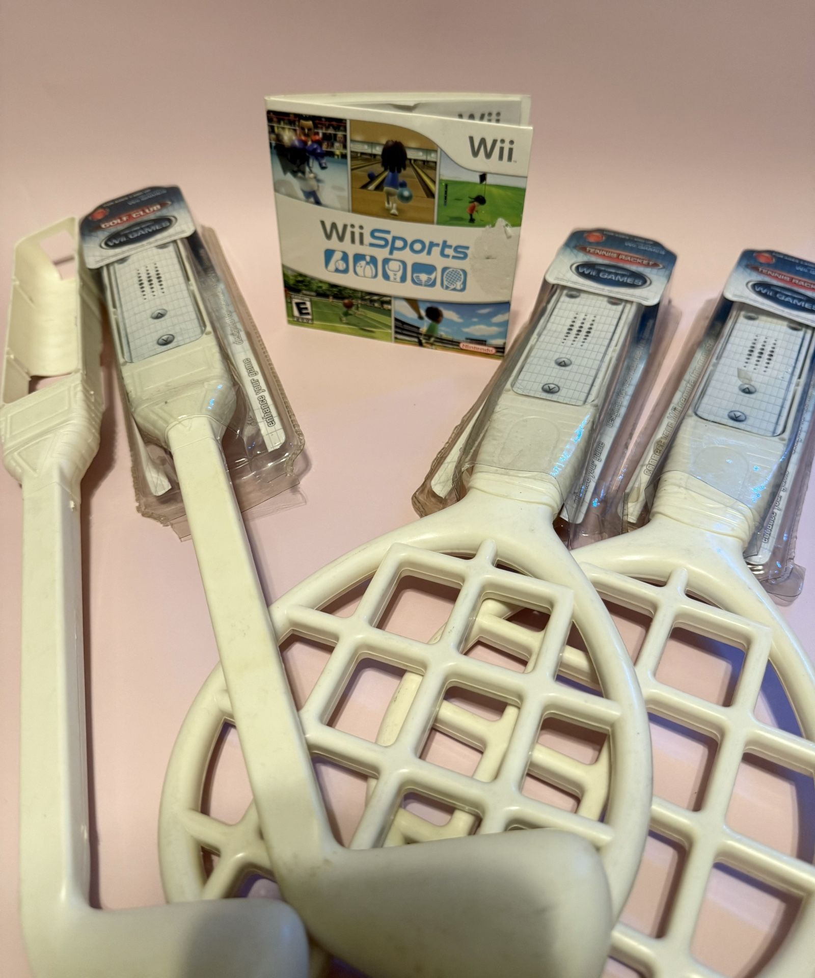 Nintendo Wii Sports Game. 2 Tennis Rackets. 2 Golf Clubs.