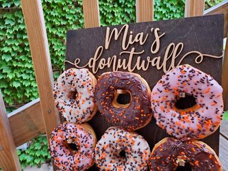 Personalized dark walnut with gold text donut wall
