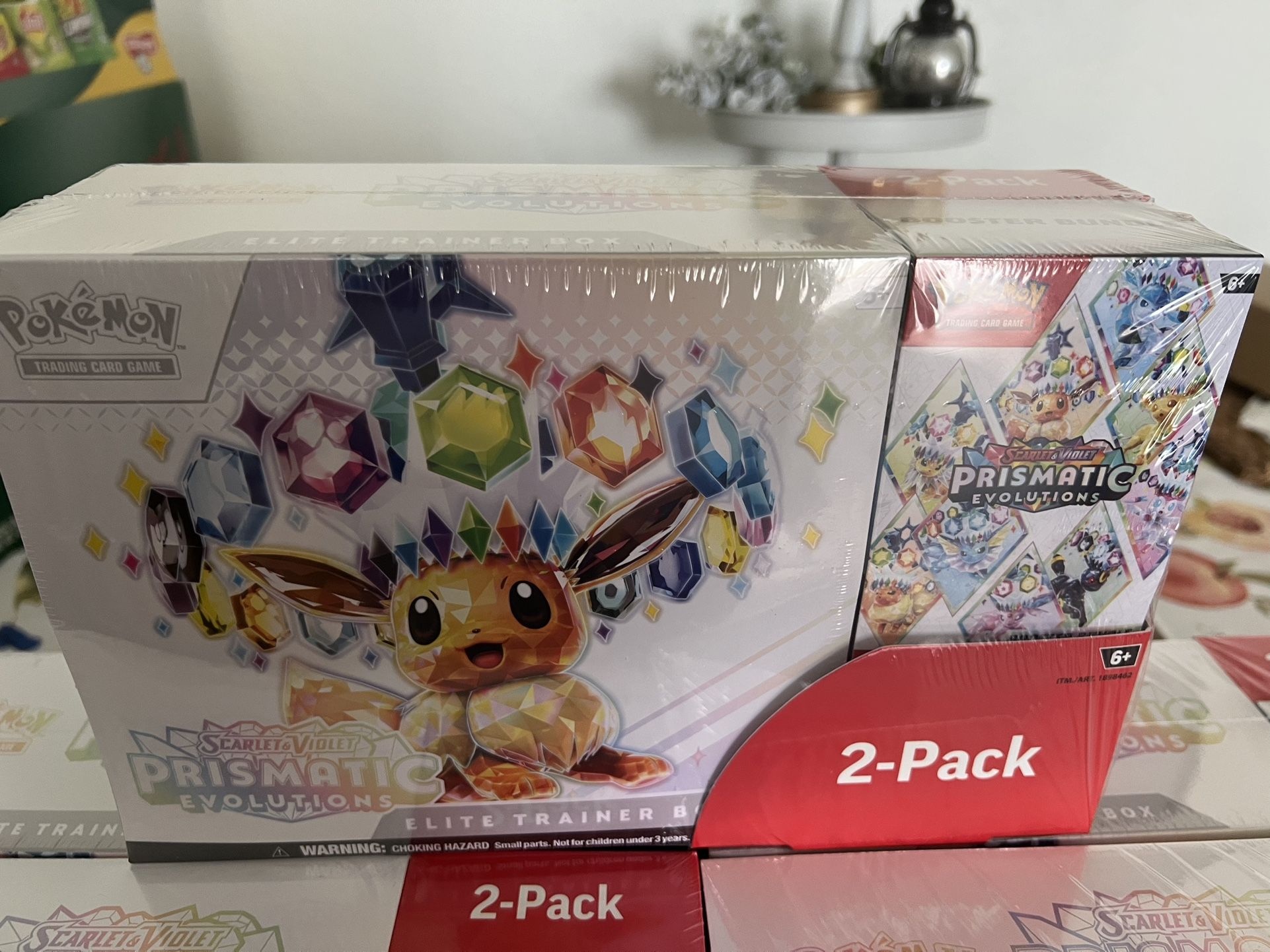 2 Pokemon Prismatic Evolution Bundles & Blooming Waters