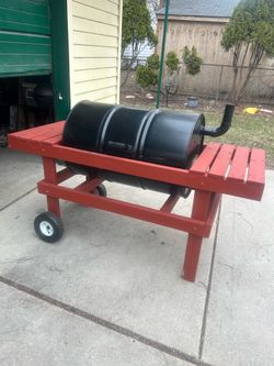 Homemade barrel and barbecue pit