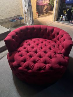 Beautiful red velvet rotating loveseat