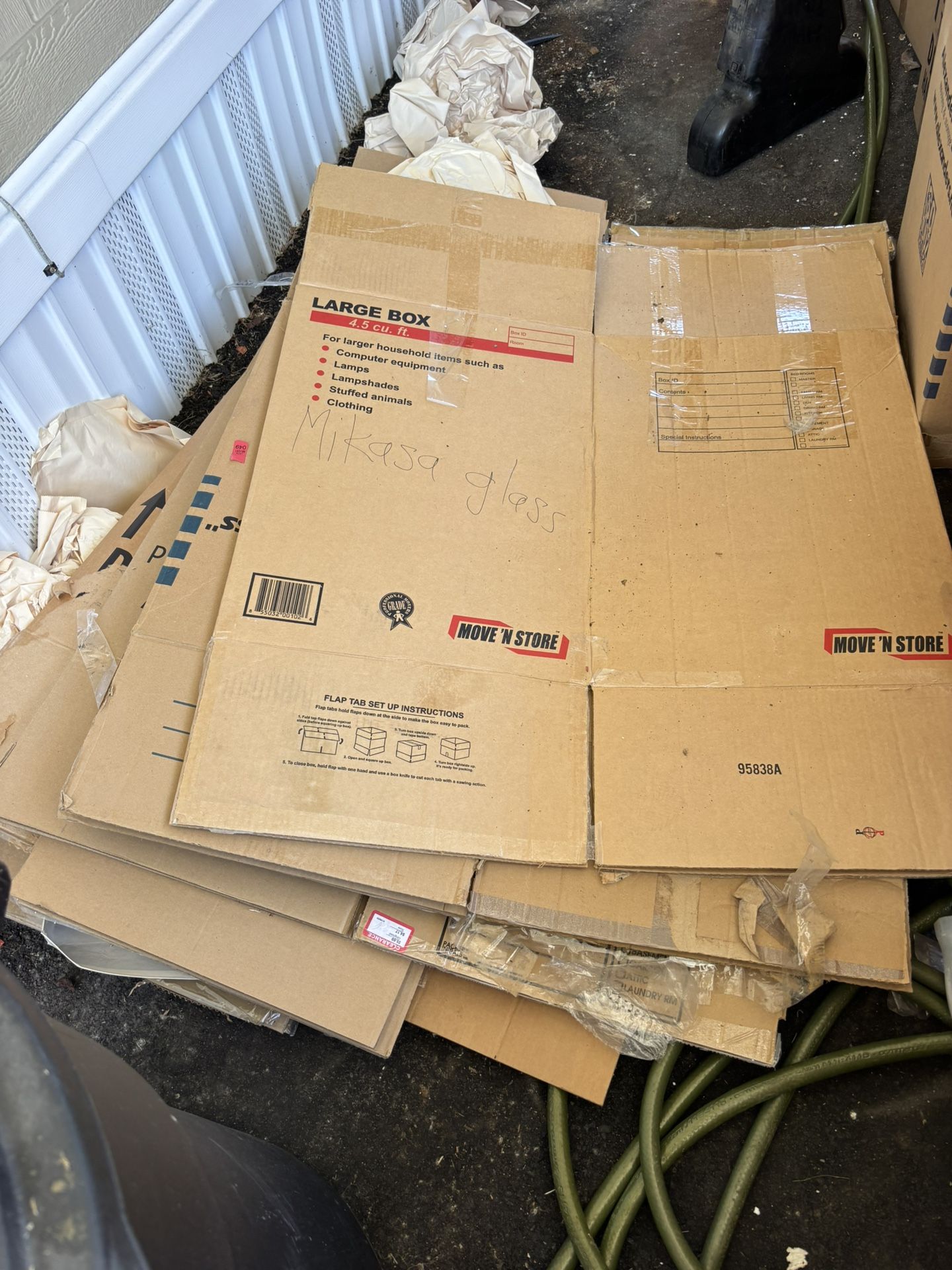 About 12 Large Used Moving Boxes. Cardboard. One Dollar Takes All 12