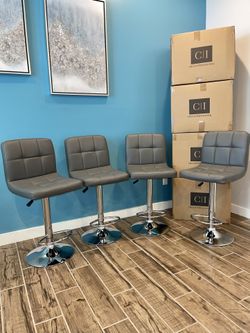 4 Brand New gray Bar Stools 