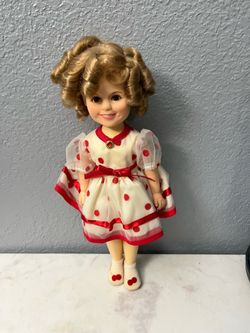 Vintage 1982 IDEAL Shirley Temple Doll.  Size 11 1/2 inches tall. Preowned very good condition.  Has been on display in a cabinet with a doll collecti