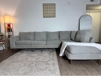 Sectional grey couch from living spaces
