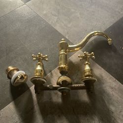 Unlacquered brass kitchen faucet and drain stopper