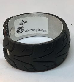 Velo Bling designs tire cuff bracelet in silver and black