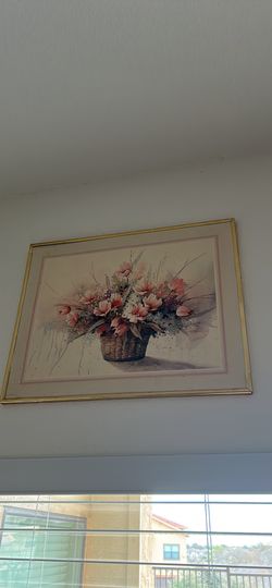 Flowers in a basket painting signed Adams framed.