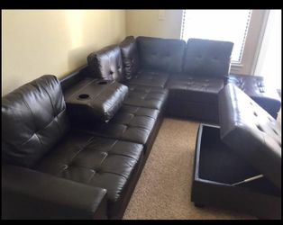 BLACK BONDED LEATHER SOFA SECTIONAL WITH CUPHOLDERS AND STORAGE OTTOMAN NEW