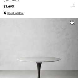 42” Diameter Tulip Table.