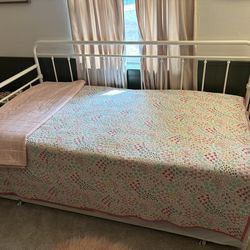 White metal trundle bed