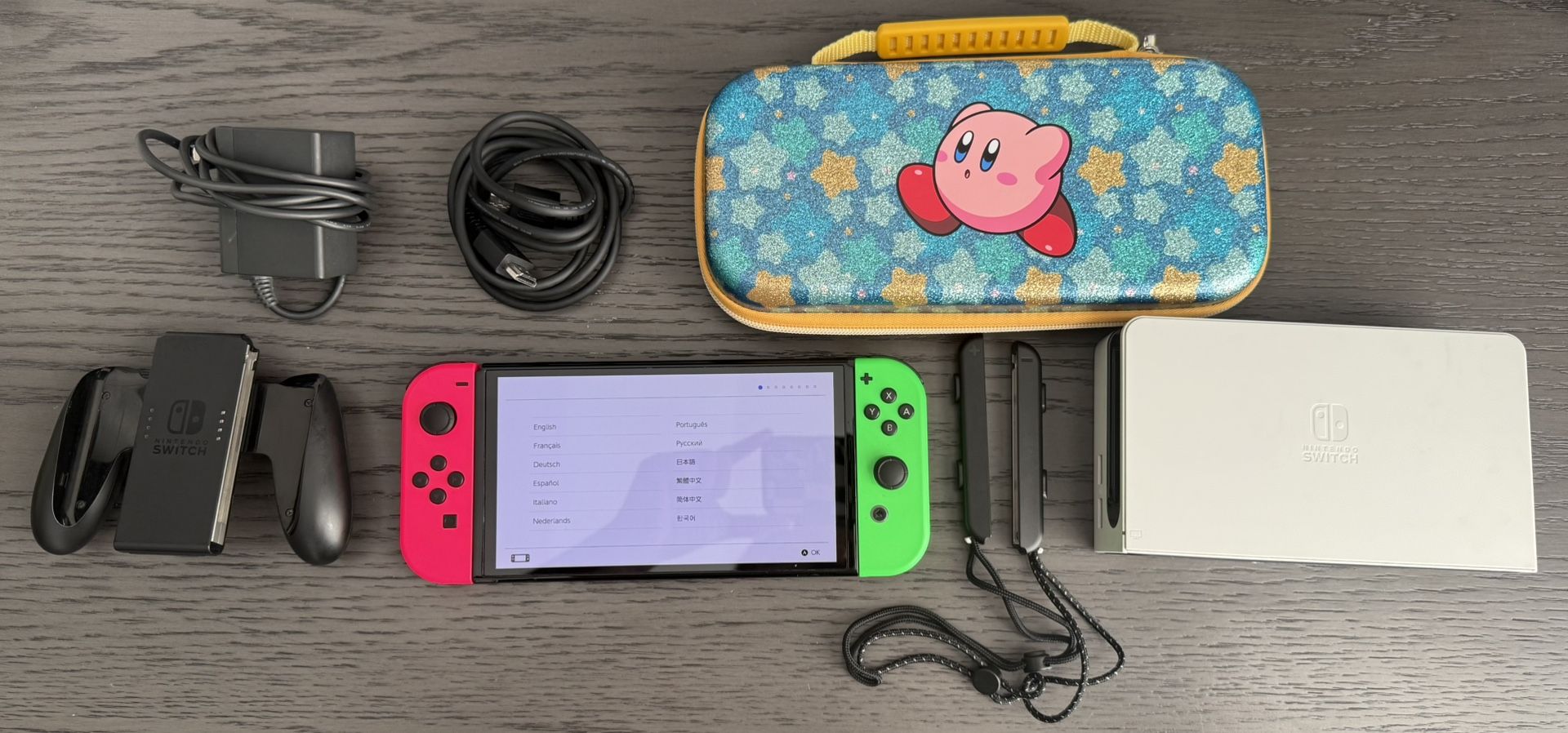 Nintendo Switch OLED with Neon Pink & Green Joy-Cons + Kirby Sparkle Case