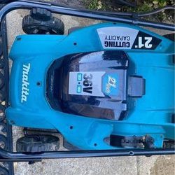 Makita batteries, Charger And Lawn Mower 