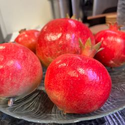 Fresh hand picked pomegranates Granadas