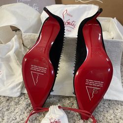  Christian Louboutin black red bottom stilettos